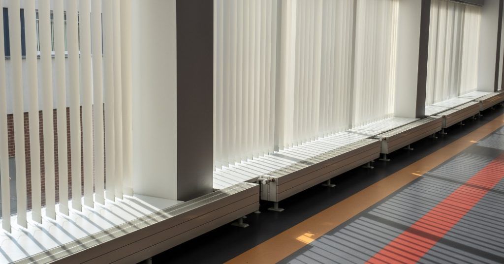 White vertical blinds in windows